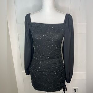 Black sparkly tight since dress in the size small